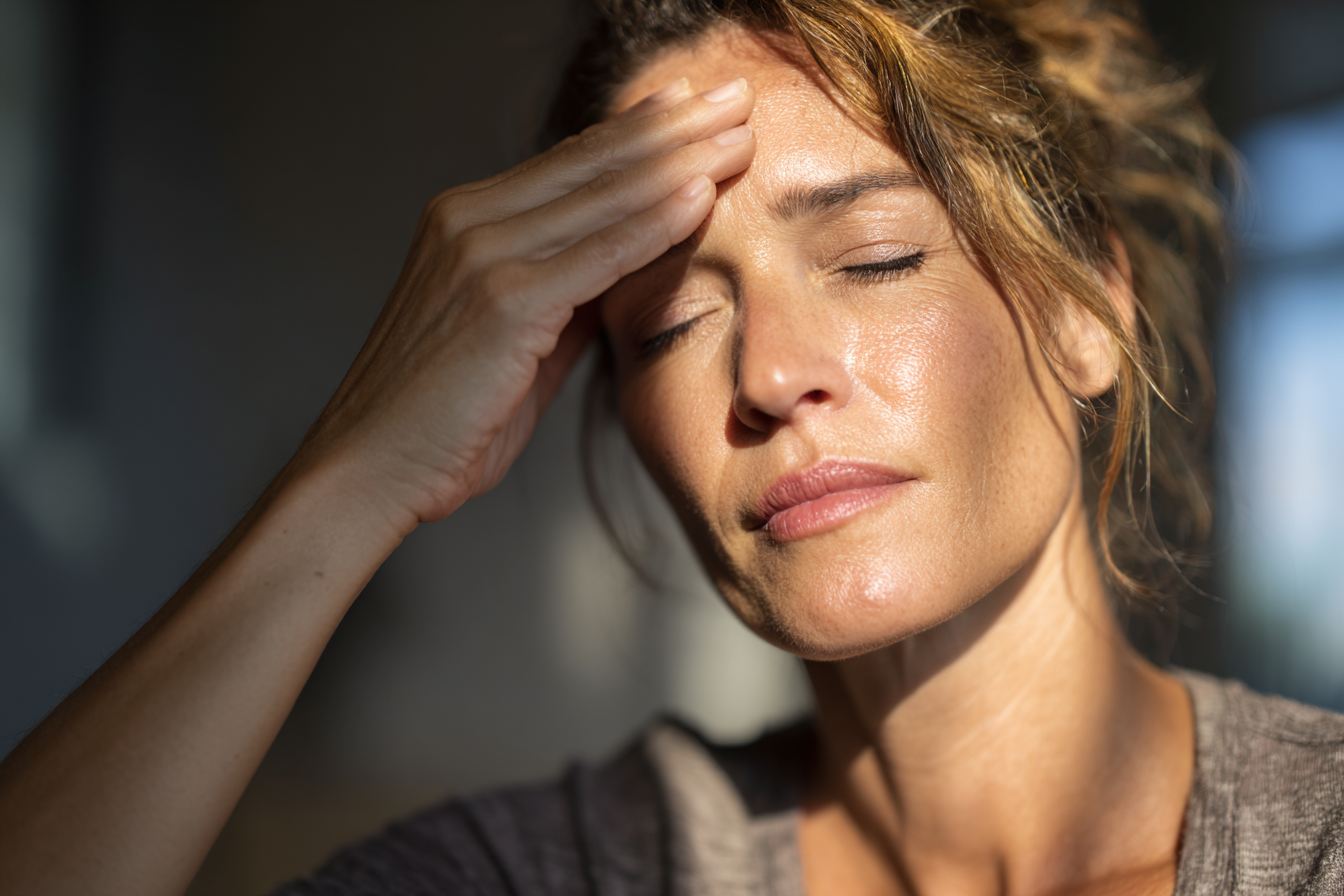 Woman feeling tired and overwhelmed